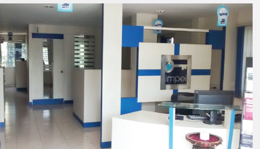 Impel Kompally, Hyderabad centre — Impel office reception with brand signage